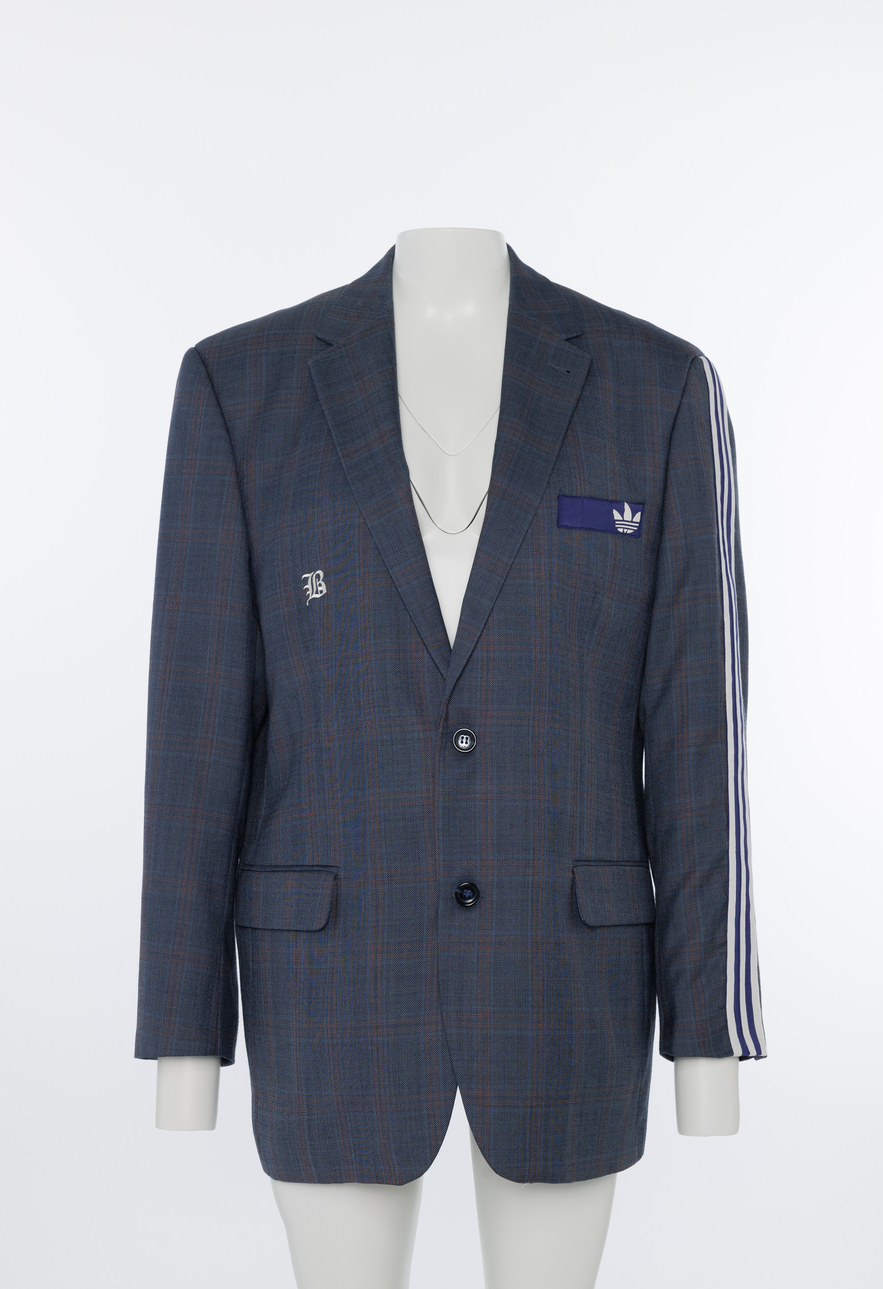 Blazer ghost-shoot met zichtbare binnenkant en label